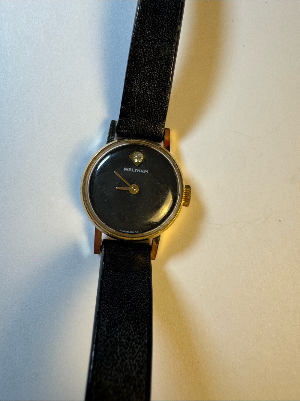 Waltham vintage analog watch with real diamond marker and calf leather strap.